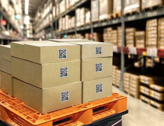 Smart logistic industry 4.0 , QR Codes Asset warehouse and inventory management supply chain technology concept. Group of boxes in storehouse can check product inside and order pick time.